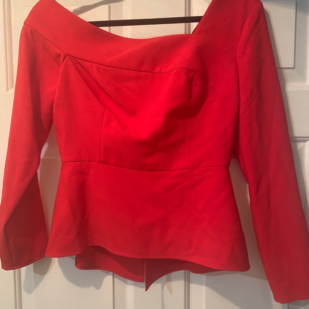 Asymmetric on shoulder peplum blouse